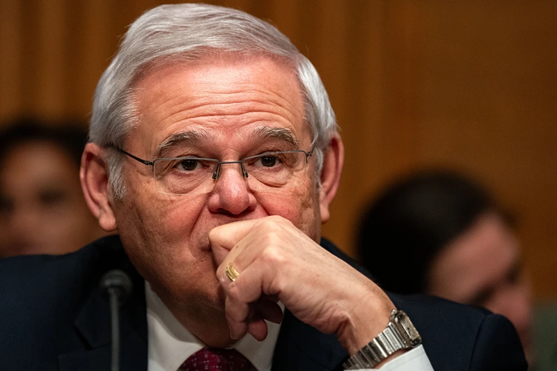 WASHINGTON, DC - MARCH 7: Sen. Bob Menendez (D-NJ) looks on before the start of a Senate Banking, Housing and Urban Affairs Committee hearing where Federal Reserve Bank Chairman Jerome Powell would testify on Capitol Hill on March, 7 2024 in Washington, DC. Powell testified during a hearing titled "The Semiannual Monetary Policy Report to the Congress." Menendez has recently been hit with new changes in the federal bribery indictment against him. (Photo by Kent Nishimura/Getty Images)
