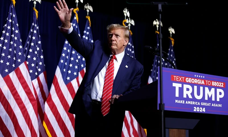 Donald Trump Holds Campaign Rally In Rome, GA ROME, GEORGIA - MARCH 09: Republican presidential candidate and former U.S. President Donald Trump leaves the stage a the conclusion of a campaign rally at the Forum River Center March 09, 2024 in Rome, Georgia. Both Trump and President Joe Biden are holding campaign events on Saturday in Georgia, a critical battleground state, two days before the its primary elections. A city of about 38,000, Rome is in the heart of conservative northwest Georgia and the center of the Congressional district represented by Rep. Majorie Taylor Green (R-GA). (Photo by Chip Somodevilla/Getty Images)