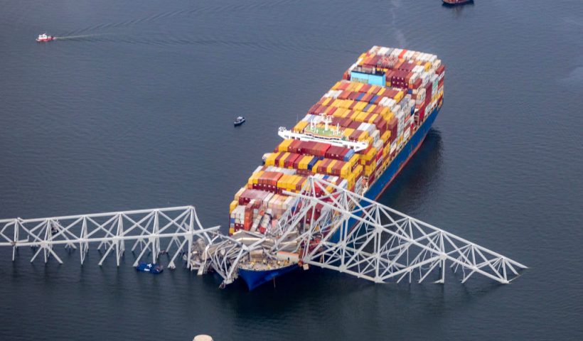 BALTIMORE, MARYLAND - MARCH 26: In an aerial view, cargo ship Dali is seen after running into and collapsing the Francis Scott Key Bridge on March 26, 2024 in Baltimore, Maryland. Rescuers are searching for at least seven people, authorities say, while two others have been pulled from the Patapsco River. (Photo by Tasos Katopodis/Getty Images)