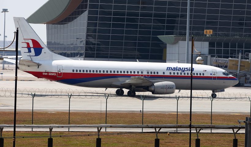 KUALA LUMPUR, MALAYSIA - MARCH 08: Malaysia Airline passenger jets are shown parked on the tarmac at the Kuala Lumpur International Airport on March 8, 2014 in Kuala Lumpur, Malaysia. Malaysia Airlines Flight MH370 from Kuala Lumpur to Beijing carrying 239 onboard was reported missing after the crew failed to check in as scheduled while flying over the sea between Malaysia and Ho Chi Minh City in Vietnam, according to published reports. (Photo by How Foo Yeen/Getty Images)