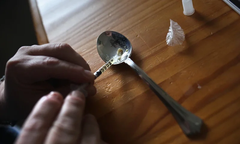 New England Towns Struggle With Opioid And Heroin Epidemic NEW LONDON, CT - MARCH 23: A heroin user prepares to inject himself on March 23, 2016 in New London, CT. Communities nationwide are struggling with the unprecidented heroin and opioid pain pill epidemic. On March 15, the U.S. Centers for Disease Control (CDC), announced guidelines for doctors to reduce the amount of opioid painkillers prescribed nationwide, in an effort to curb the epidemic. The CDC estimates that most new heroin addicts first became hooked on prescription pain medication before graduating to heroin, which is stronger and cheaper. (Photo by John Moore/Getty Images)