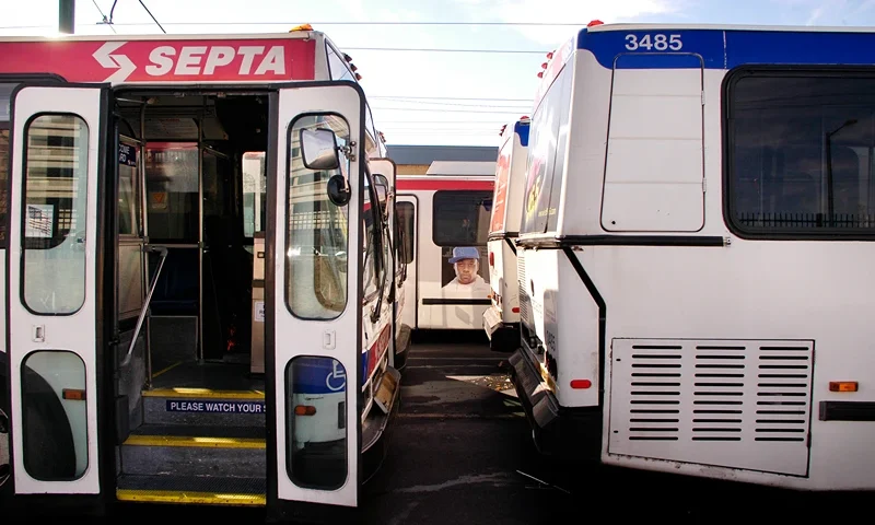 Philadelphia Transit Unions Go On Strike PHILADELPHIA - OCTOBER 31: Buses sit idle at SEPTA's (Southeastern Pennsylvania Transportation Authority) Frankford Transportation Center as members of Transport Workers Union Local 234 and United Transportation Union Local 1594 picket during a strike October 31, 2005 in Philadelphia, Pennsylvania. Much of the Philadelphia region's mass transit system is shut down leaving some 400,000 subway, bus, and trolley riders without transportation. One of the major stumbling blocks in negotiations is SEPTA wants unionized workers to pay for a portion of their healthcare benefits. No new negotiation sessions are scheduled. (Photo by William Thomas Cain/Getty Images)