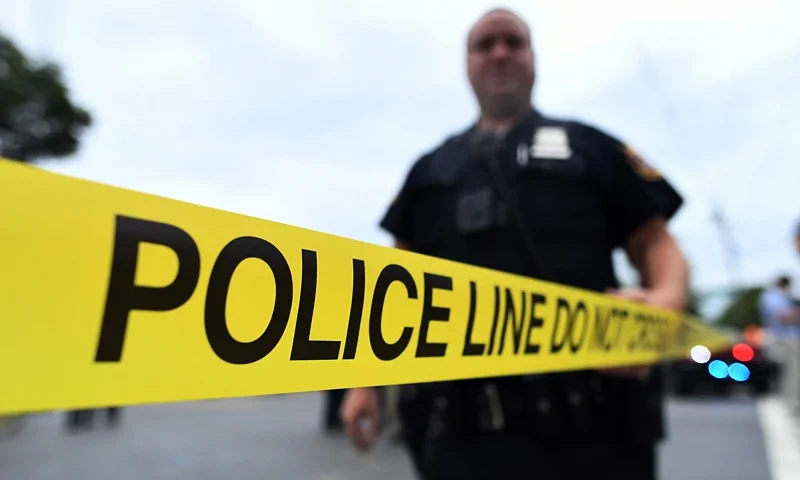 TOPSHOT-US-ATTACKS-NEW YORK-NEW JERSEY TOPSHOT - Law enforcement officers secure the area where they allegedly arrested terror suspect Ahmad Khan Rahami following a shootout in Linden, New Jersey, on September 19, 2016.16. An "armed and dangerous" Afghan-born suspect wanted in the weekend bomb attacks in New York and New Jersey was wounded Monday in a shootout with police and taken into custody. Federal investigators released a mugshot of 28-year-old Ahmad Khan Rahami, who has brown hair, brown eyes and a brown beard, saying he was last known to live in Elizabeth, a town adjacent to Newark International Airport. (Photo by Jewel SAMAD / AFP) (Photo by JEWEL SAMAD/AFP via Getty Images)