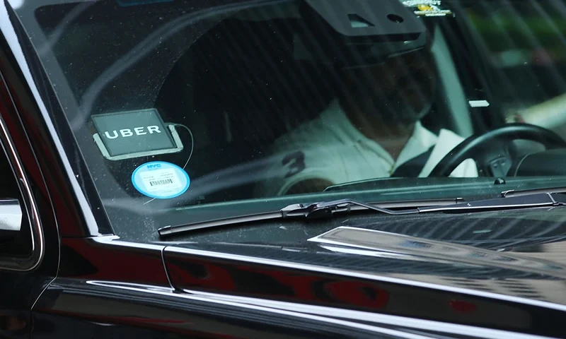 Uber Releases Results Of Internal Sexual Harassment Investigation NEW YORK, NY - JUNE 14: An Uber SUV waits for a client in Manhattan a day after it was announced that Uber co-founder Travis Kalanick will take a leave of absence as chief executive on June 14, 2017 in New York City. The move came after former attorney general Eric H. Holder Jr. and his law firm, Covington & Burling, released 13 pages of recommendations compiled as part of an investigation of sexual harassment at the ride-hailing car service. (Photo by Spencer Platt/Getty Images)