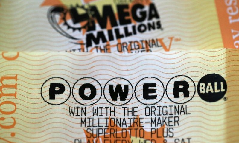 SAN ANSELMO, CA - JANUARY 03: Powerball and Mega Millions lottery tickets are displayed on January 3, 2018 in San Anselmo, California. The Powerball jackpot and Mega Millions jackpots are both over $400 million at the same time for the first time. The Mega Millions $418 million jackpot would be the fourth largest and the $460 million Powerball jackpot would be the seventh largest in the game's history. (Photo by Justin Sullivan/Getty Images)
