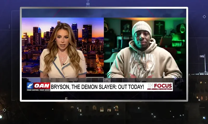 Video still from In Focus on One America News Network showing a split screen of the host on the left side, and on the right side is the guest, Bryson Gray.