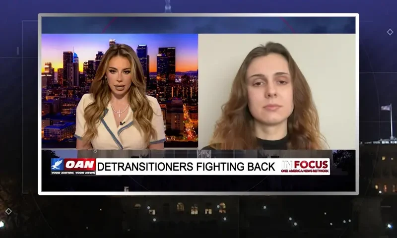 Video still from In Focus on One America News Network showing a split screen of the host on the left side, and on the right side is the guest, Luka Hein, Mark Trammell.