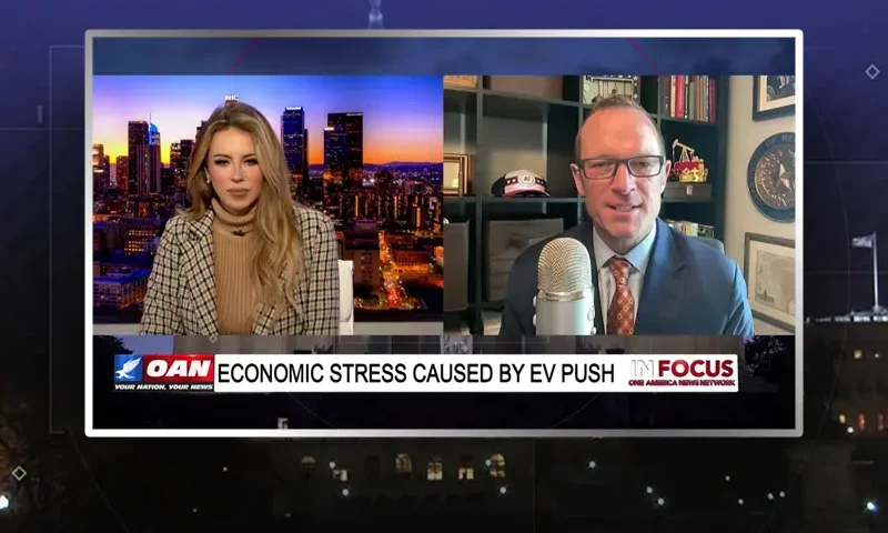 Video still from In Focus on One America News Network showing a split screen of the host on the left side, and on the right side is the guest, Jason Isaac.