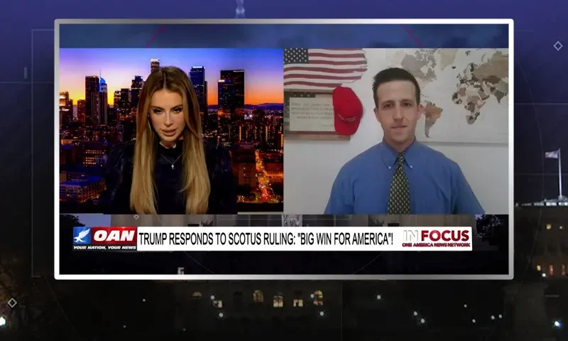 Video still from In Focus on One America News Network showing a split screen of the host on the left side, and on the right side is the guest, Frankie Stockes.
