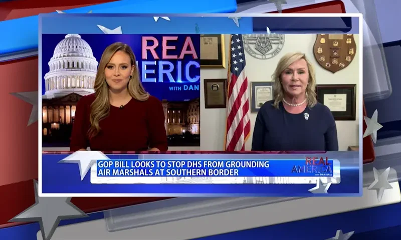 Video still from Real America on One America News Network showing a split screen of the host on the left side, and on the right side is the guest, Sonya LaBosco.