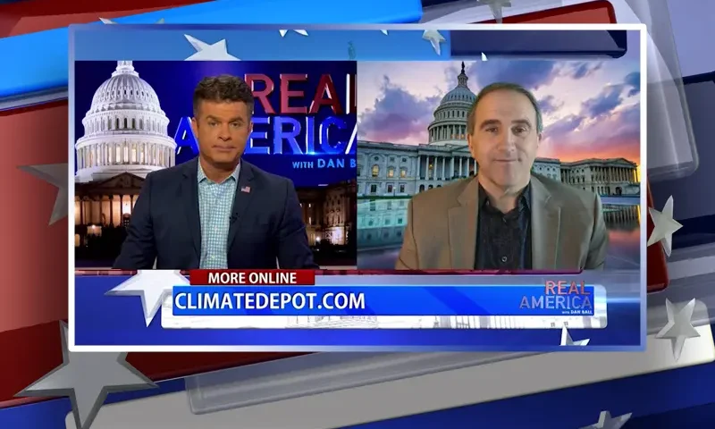 Video still from Real America on One America News Network showing a split screen of the host on the left side, and on the right side is the guest, Marc Morano.