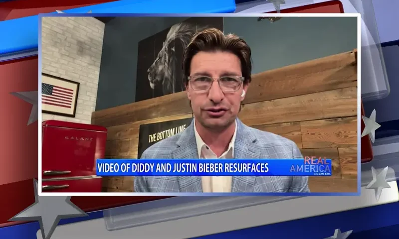 Video still from Real America on One America News Network during an interview with the guest, Jaco Booyens.