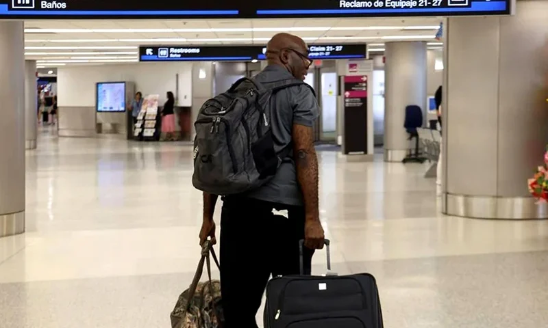 WORLD-NEWS-HAITI-EVACUATIONS-2-MI The first evacuation flight out of Cap-Haitien, Haiti, landed at Miami International Airport on Sunday, March 17, 2024. Francius St. Alma of Miami was among the passengers. (Carl Juste/Miami Herald/Tribune News Service via Getty Images)