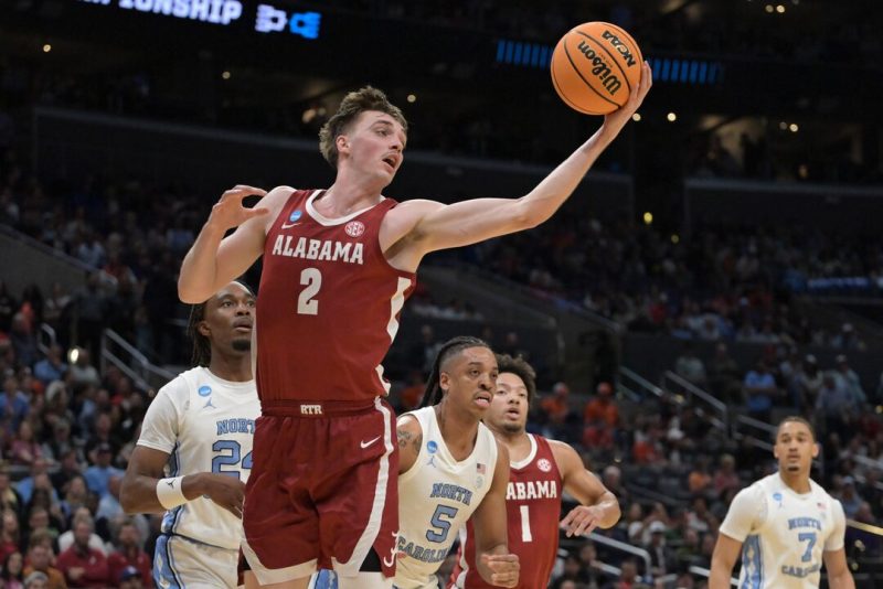 Alabama Crimson Tide forward Grant Nelson (2) grabs a rebound in the first half against the North Carolina Tar Heels in the semifinals of the West Regional of the 2024 NCAA Tournament at Crypto.com Arena. Mandatory Credit: Jayne Kamin-Oncea-USA TODAY Sports