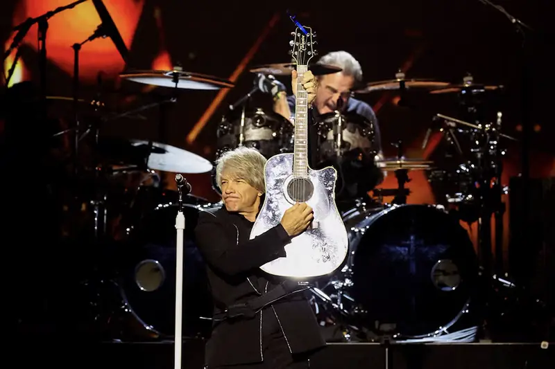 Honoree Jon Bon Jovi performs on stage during the MusiCares Person of the Year Gala in Los Angeles, California, U.S., February 2, 2024. REUTERS/Mario Anzuoni/File Photo