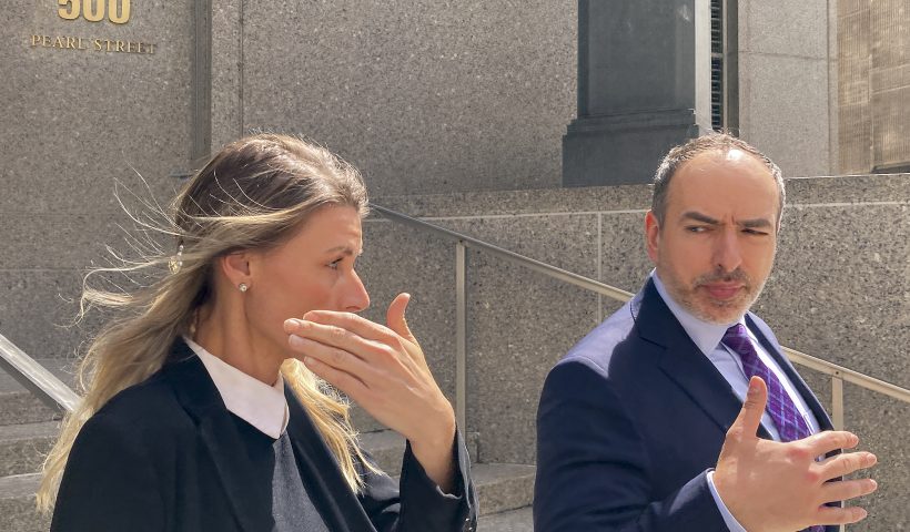 Aimee Harris, left, walks out of Manhattan federal court, Tuesday, April 9, 2024, in New York. The Florida mother has been sentenced to a month in prison and three months of home confinement for stealing and selling President Joe Biden's daughter's diary four years ago. (AP Photo/Larry Neumeister)