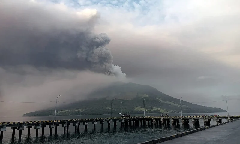 Mount Ruang volcano is seen during the eruption from Tagulandang island, Indonesia, Thursday, April 18, 2024. Indonesian authorities closed an airport and residents left homes near an erupting volcano Thursday due to the dangers of spreading ash, falling rocks, hot volcanic clouds and the possibility of a tsunami. (AP Photo/ Hendra Ambalao)