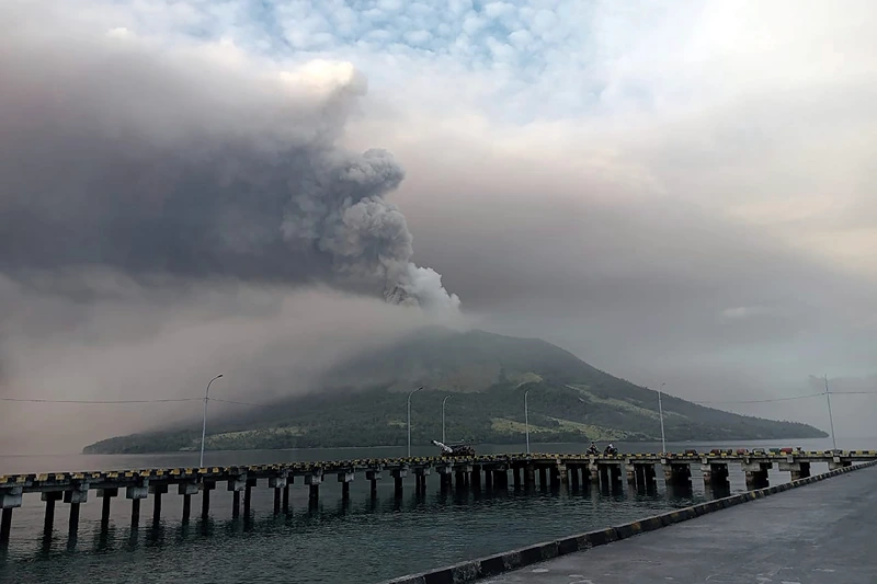 Mount Ruang volcano is seen during the eruption from Tagulandang island, Indonesia, Thursday, April 18, 2024. Indonesian authorities closed an airport and residents left homes near an erupting volcano Thursday due to the dangers of spreading ash, falling rocks, hot volcanic clouds and the possibility of a tsunami. (AP Photo/ Hendra Ambalao)