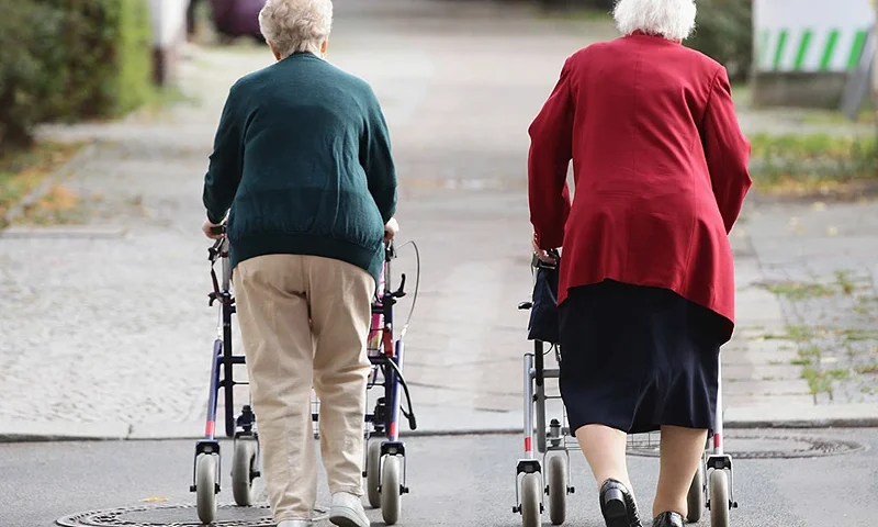 BERLIN - SEPTEMBER 10: Two elderly women push shopping carts down a street on September 10, 2010 in Berlin, Germany. Germany's elderly population is growing and its overall population is shrinking. Demographers and economists argue that the German government must improve policies designed to encourage immigration of skilled labour from abroad if German economic growth is to be maintained. (Photo by Sean Gallup/Getty Images)