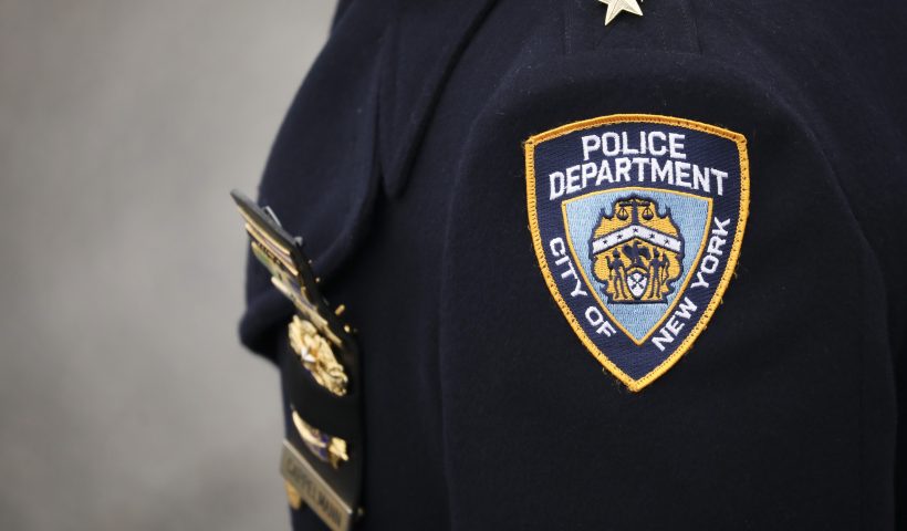 HAMPTON BAYS, NY - FEBRUARY 20: An NYPD officer arrives for the funeral service of fallen NYPD Detective Brian Simonsen at the Church of St. Rosalie, February 20, 2019 in Hampton Bays, New York. Thousands of area police officers and law enforcement personnel attended the funeral. Simonsen was killed by friendly fire while responding with fellow NYPD officers to a robbery at a store in Queens last week. Simonsen is survived by his wife and mother and will be interned at Jamesport Cemetery in nearby Riverhead, New York. (Photo by Drew Angerer/Getty Images)