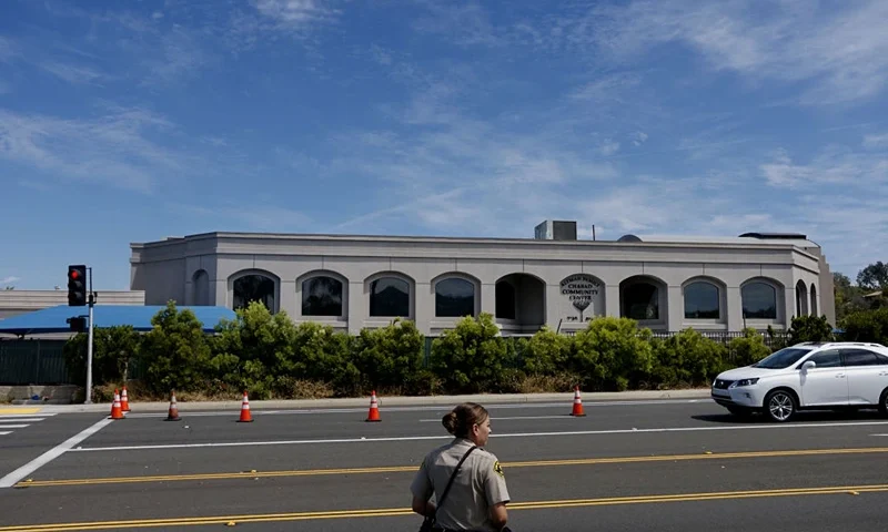 A San Diego County Sheriff's deputy directs traffic in front of the Chabad of Poway Synagogue on Sunday, April 28, 2019 in Poway, California, one day after a teenage gunman opened fire, killing one person and injuring three others including the rabbi as worshippers marked the final day of Passover, authorities said. - The shooting in the town of Poway, north of San Diego, came exactly six months after a white supremacist killed 11 people at Pittsburgh's Tree of Life synagogue -- the deadliest attack on the Jewish community in US history. (Photo by SANDY HUFFAKER / AFP) (Photo credit should read SANDY HUFFAKER/AFP via Getty Images)