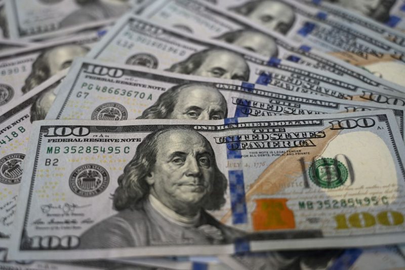 A picture taken on December 7, 2021 in Istanbul shows US dollars banknotes. - Turkey's annual inflation rate jumped over 20 percent in November, official data showed  on December 3, 2021, after a currency crisis last month in which the Turkish lira hit record lows against the dollar. (Photo by Ozan KOSE / AFP) (Photo by OZAN KOSE/AFP via Getty Images)