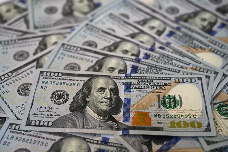 TURKEY-ECONOMY-CURRENCY-DOLLARS-FEATURE
A picture taken on December 7, 2021 in Istanbul shows US dollars banknotes. (Photo by Ozan KOSE / AFP) (Photo by OZAN KOSE/AFP via Getty Images)