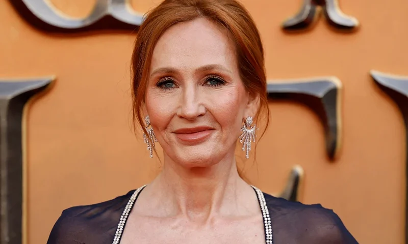 British writer J.K Rowling poses on the red carpet after arriving to attend the World Premiere of the film "Fantastic Beasts: The Secrets of Dumbledore" in London on March 29, 2022. (Photo by Tolga Akmen / AFP) (Photo by TOLGA AKMEN/AFP via Getty Images)