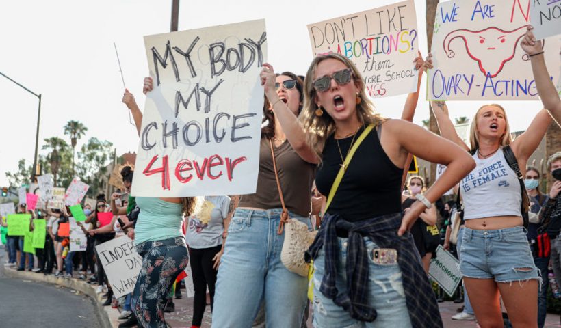 Abortion rights protesters chant during a Pro Choice rally at the Tucson Federal Courthouse in Tucson, Arizona on Monday, July 4, 2022. (Photo by SANDY HUFFAKER / AFP) (Photo by SANDY HUFFAKER/AFP via Getty Images)