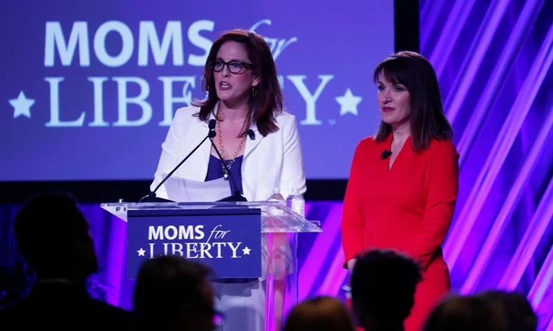 TAMPA, FL - JULY 15: Moms for Liberty founders Tiffany Justice (L) and Tina Descovich give the opening remarks before Florida Governor Ron DeSantis speaks during the inaugural Moms For Liberty Summit at the Tampa Marriott Water Street on July 15, 2022 in Tampa, Florida. DeSantis is up for reelection in the 2022 Gubernatorial race against Democratic frontrunner Rep. Charlie Crist (D-FL). (Photo by Octavio Jones/Getty Images)