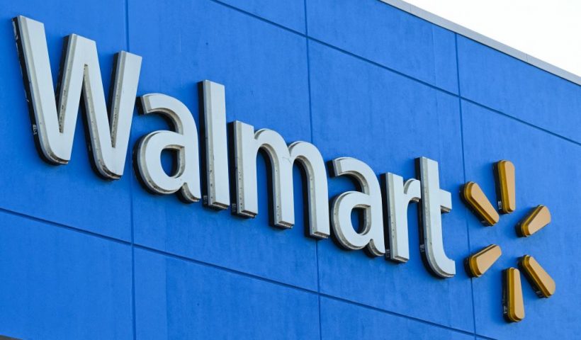 The Walmart logo is seen outside a Walmart store in Burbank, California on August 15, 2022. - Walmart, the largest retailer the United States, will report second quarter earnings on August 16, 2022. (Photo by Robyn Beck / AFP) (Photo by ROBYN BECK/AFP via Getty Images)