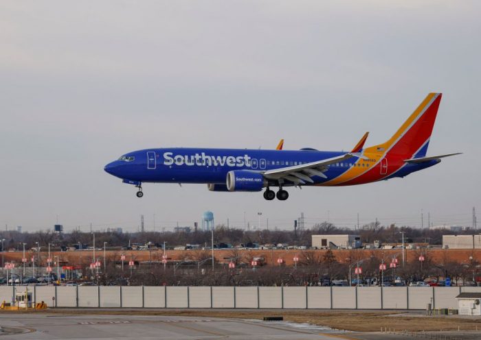 A Southwest Airlines passenger jet lands at Chicago Midway International Airport in Chicago, Illinois, on December 28, 2022. (Photo by KAMIL KRZACZYNSKI / AFP) (Photo by KAMIL KRZACZYNSKI/AFP via Getty Images)