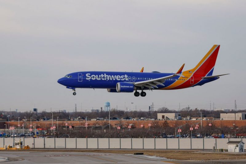 A Southwest Airlines passenger jet lands at Chicago Midway International Airport in Chicago, Illinois, on December 28, 2022. - The perfect storm of fierce snow squalls, howling wind and sub-zero temperatures forced the cancellation of thousands of flights in recent days, including around 5,900 on Tuesday and Wednesday, according to tracking site FlightAware.com. Most of the cancellations on December 27-28 were at Southwest Airlines, which pulled more than 60 percent of its flights due to cascading logistics issues. (Photo by KAMIL KRZACZYNSKI / AFP) (Photo by KAMIL KRZACZYNSKI/AFP via Getty Images)