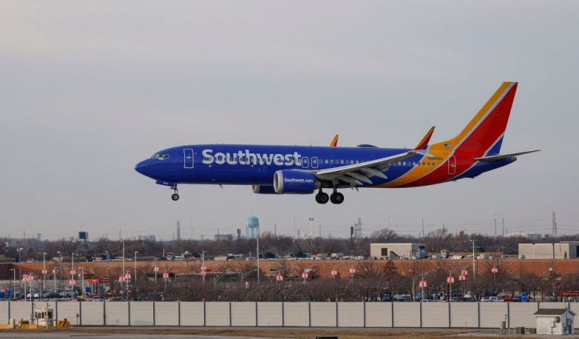 A Southwest Airlines passenger jet lands at Chicago Midway International Airport in Chicago, Illinois, on December 28, 2022. - The perfect storm of fierce snow squalls, howling wind and sub-zero temperatures forced the cancellation of thousands of flights in recent days, including around 5,900 on Tuesday and Wednesday, according to tracking site FlightAware.com. Most of the cancellations on December 27-28 were at Southwest Airlines, which pulled more than 60 percent of its flights due to cascading logistics issues. (Photo by KAMIL KRZACZYNSKI / AFP) (Photo by KAMIL KRZACZYNSKI/AFP via Getty Images)