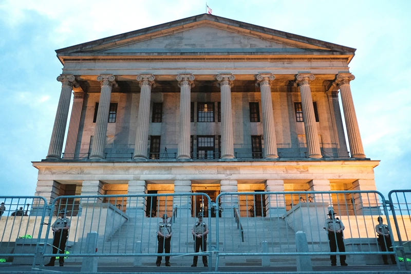 Protests Continue Across The Country In Reaction To Death Of George Floyd
NASHVILLE, TENNESSEE - JUNE 04: Police are seen surrounding the Tennessee State Capitol building on June 04, 2020 in Nashville, Tennessee. Minneapolis Police officer Derek Chauvin was filmed kneeling on George Floyd's neck. Floyd was later pronounced dead at a local hospital. Across the country, Floyd's death has set off days and nights of protests as its the most recent in a series of deaths of African Americans by the police. (Photo by Jason Kempin/Getty Images)