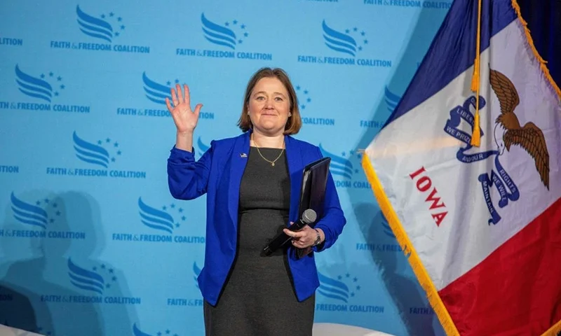 Iowa Attorney General Brenna Bird waves to the crowd during the Iowa Faith and Freedom Coalition's Road to Victory Conference at the Horizon Events Center in Clive, Iowa, on April 22, 2023. (Photo by Rachel MUMMEY / AFP) (Photo by RACHEL MUMMEY/AFP via Getty Images)