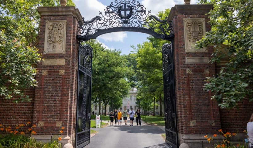 CAMBRIDGE, MASSACHUSETTS - JUNE 29: People walk through the gate on Harvard Yard at the Harvard University campus on June 29, 2023 in Cambridge, Massachusetts. The U.S. Supreme Court ruled that race-conscious admission policies used by Harvard and the University of North Carolina violate the Constitution, bringing an end to affirmative action in higher education. (Photo by Scott Eisen/Getty Images)