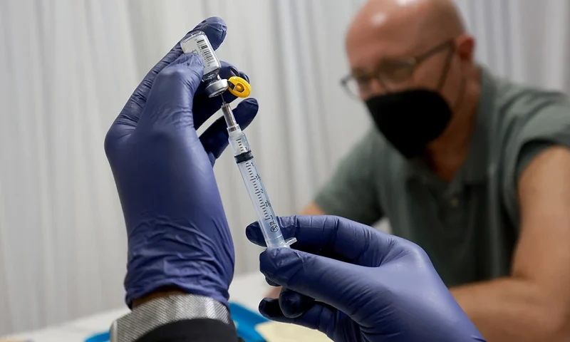 Floridians Receive The Monkeypox Vaccine As Virus Continues To Spread WILTON MANORS, FLORIDA - JULY 12: A healthcare worker prepares to administer a vaccine to Michael Nicot for the prevention of monkeypox the Pride Center on July 12, 2022 in Wilton Manors, Florida. The center is offering the free smallpox/monkeypox vaccinations from the Florida Department of Health in Broward County as South Florida leads the state in the number of people infected. (Photo by Joe Raedle/Getty Images)