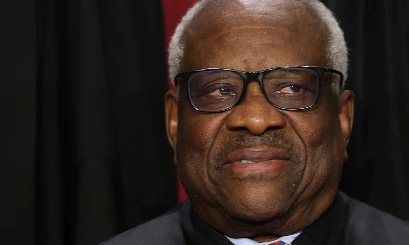 WASHINGTON, DC - OCTOBER 07: United States Supreme Court Associate Justice Clarence Thomas poses for an official portrait at the East Conference Room of the Supreme Court building on October 7, 2022 in Washington, DC. The Supreme Court has begun a new term after Associate Justice Ketanji Brown Jackson was officially added to the bench in September. (Photo by Alex Wong/Getty Images)