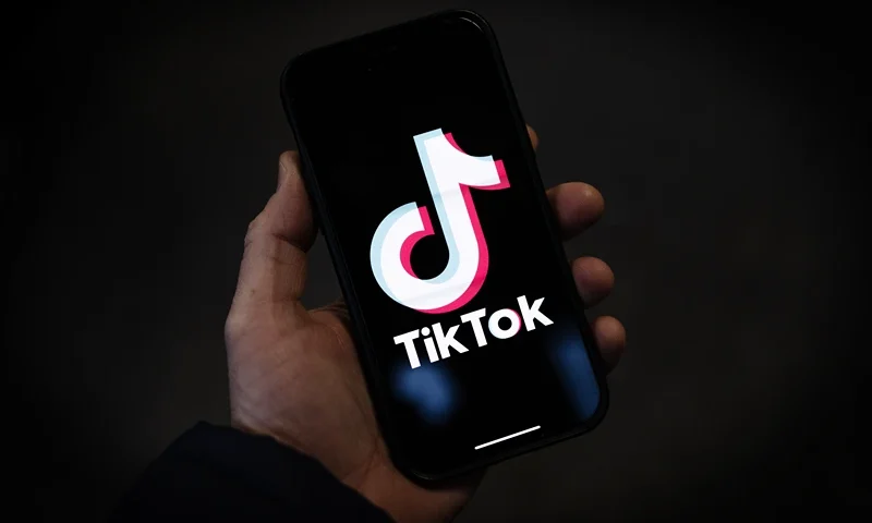 LONDON, ENGLAND - FEBRUARY 28: In this photo illustration, a TikTok logo is displayed on an iPhone on February 28, 2023 in London, England. This week, the US government and European Union's parliament have announced bans on installing the popular social media app on staff devices. (Photo by Dan Kitwood/Getty Images)
