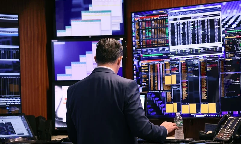 NEW YORK, NEW YORK - OCTOBER 04: Traders work on the floor of the New York Stock Exchange during morning trading on October 04, 2023 in New York City. The market opened up slightly high amid the release of the ADP employment report after all three major indexes closed dropping over 1% with the Dow Jones dropping 425 points. (Photo by Michael M. Santiago/Getty Images)