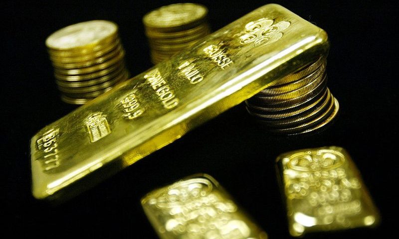 NEW YORK - JANUARY 9: Gold bullion bars and coins are seen for sale at Manfra, Tordella and Brookes, Inc. January 9, 2003 in New York City. The price of gold has risen by nearly 30 percent over the past year with investors looking for stability as war with Iraq has become more likely. (Photo by Mario Tama/Getty Images)