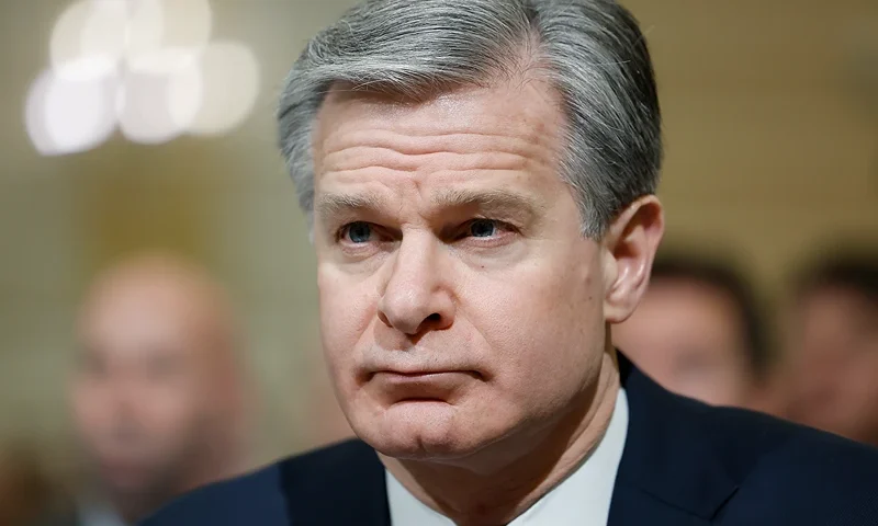 WASHINGTON, DC - MARCH 12: Federal Bureau of Investigation Director Christopher Wray listens at a hearing with the House Select Intelligence Committee in the Cannon Office Building on March 12, 2024 in Washington, DC. Leaders from the U.S. intelligence community are participating in hearings with both the Senate and House intelligence committees to lay out their perceived global threats to the United States. (Photo by Anna Moneymaker/Getty Images)