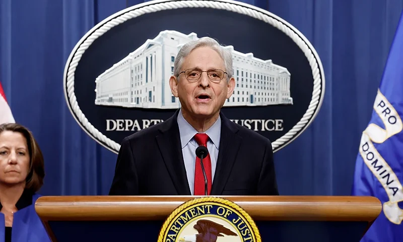 WASHINGTON, DC - MARCH 21: U.S. Attorney General Merrick Garland speaks alongside Deputy Attorney General Lisa Monaco during a news conference at the Department of Justice Building on March 21, 2024 in Washington, DC. During the news conference Garland and DOJ officials announced the department would be taking action against Apple, claiming that the tech company has an illegal monopoly on smartphones, violating antitrust laws. (Photo by Anna Moneymaker/Getty Images)