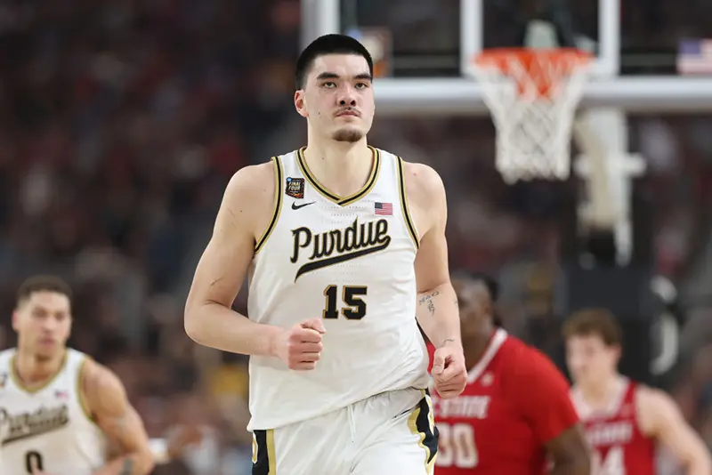 Zach Edey #15 of the Purdue Boilermakers jogs across the court in the second half against the North Carolina State Wolfpack in the NCAA Men's Basketball Tournament Final Four semifinal game at State Farm Stadium on April 06, 2024 in Glendale, Arizona. (Photo by Christian Petersen/Getty Images)