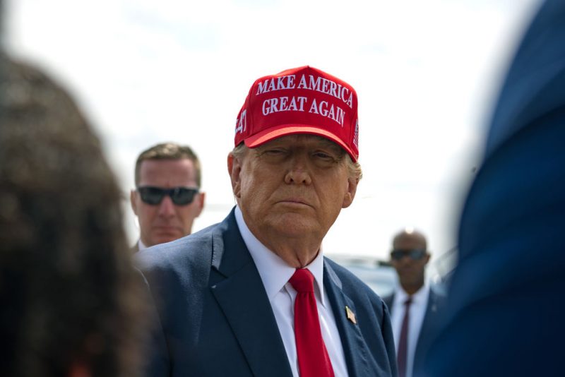 ATLANTA, GEORGIA - APRIL 10: Former U.S. President Donald Trump speaks to the media as he arrives at the Atlanta Airport on April 10, 2024 in Atlanta, Georgia. Trump is visiting Atlanta for a campaign fundraising event he is hosting. (Photo by Megan Varner/Getty Images)
