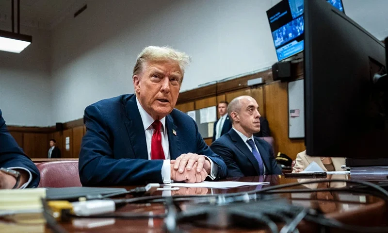 NEW YORK, NEW YORK - APRIL 15: Former U.S. President Donald Trump appears with his legal team ahead of the start of jury selection at Manhattan criminal court on April 15, 2024 in New York City. Former President Donald Trump faces 34 felony counts of falsifying business records in the first of his criminal cases to go to trial. (Photo by Jabin Botsford-Pool/Getty Images)