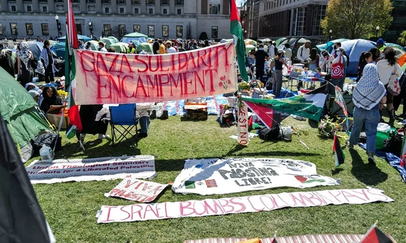 People rally on the campus of Columbia University which is occupied by pro-Palestinian protesters in New York on April 22, 2024. US President Joe Biden condemned any anti-Semitism on college campuses on April 21, 2024 as pro-Palestinian protesters at Columbia University spent their fifth day demanding the school sever financial ties with key US ally Israel. (Photo by Charly TRIBALLEAU / AFP) (Photo by CHARLY TRIBALLEAU/AFP via Getty Images)