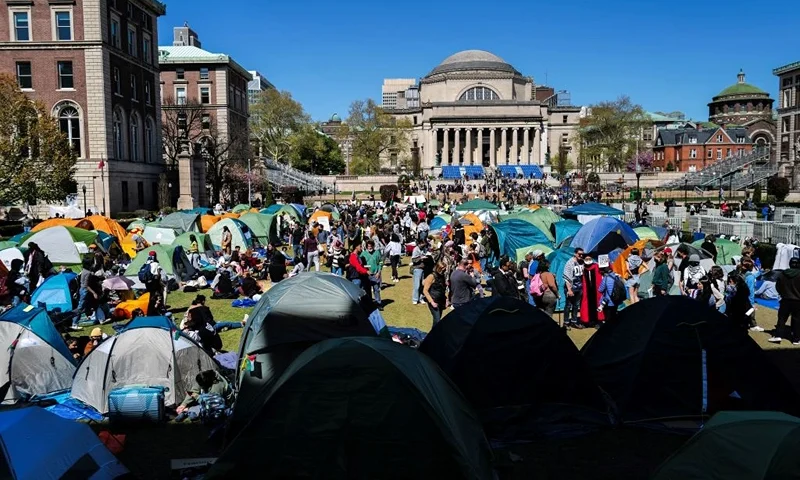 People rally on the campus of Columbia University which is occupied by pro-Palestian protesters in New York on April 22, 2024. US President Joe Biden condemned any anti-Semitism on college campuses on April 21, 2024 as pro-Palestinian protesters at Columbia University spent their fifth day demanding the school sever financial ties with key US ally Israel. (Photo by Charly TRIBALLEAU / AFP) (Photo by CHARLY TRIBALLEAU/AFP via Getty Images)