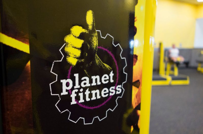A woman leg lifts at Planet Fitness in the Columbia Mall on July 24, 2017 in Bloomsburg, Pennsylvania. - Mall space is being repurposed as more department store chains close stores that have traditionally served as "anchors" at malls. The Planet Fitness now occupies the space that was previously a Sears. Abandoned by the big brands, deserted by the young, the American mall, once temples of the shopping, have become ghost towns, victims of the explosion of online shopping. (Photo by Don EMMERT / AFP) / TO GO WITH AFP STORY by John BIERS, "Deserted, US shopping centers look for a future" (Photo by DON EMMERT/AFP via Getty Images)